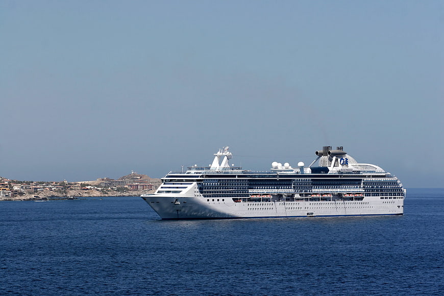 White Cruise Ship Sailing on Blue Sea