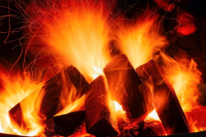 Close-Up of Burning Firewood and Bright Orange Flames