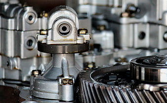Close-up of disassembled engine gears and mechanical parts