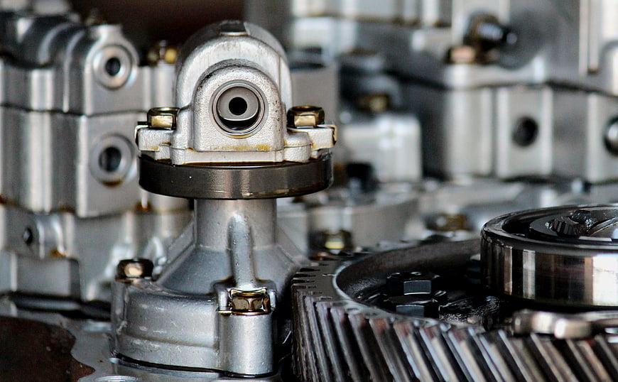 Close-up of disassembled engine gears and mechanical parts