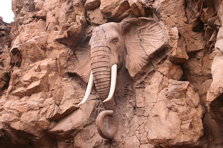 Rock-Carved Elephant Head Sculpture In Red Sandstone