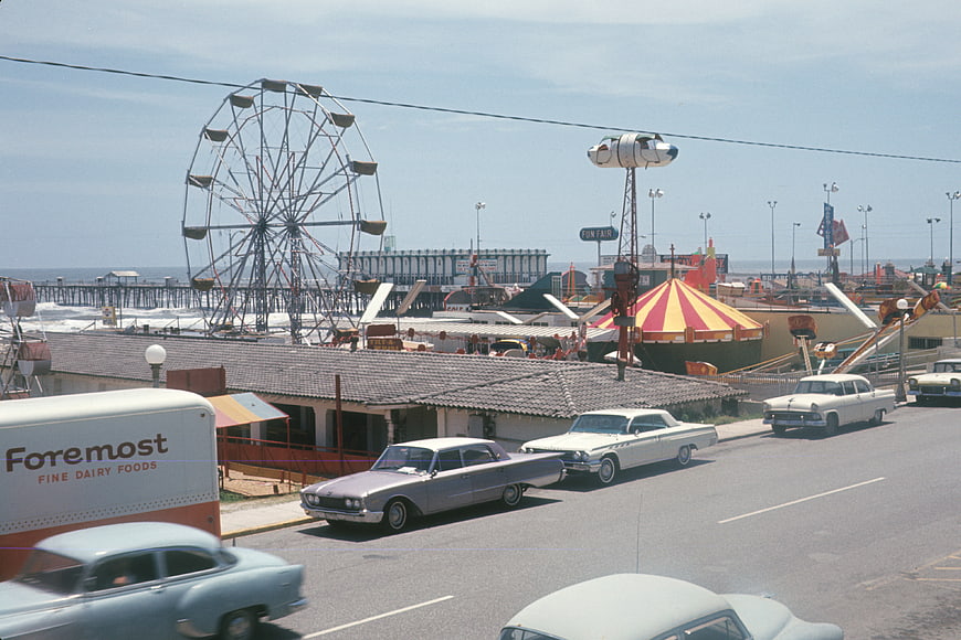 Vintage Cars on Beach Road with Ferris Wheel and Pier