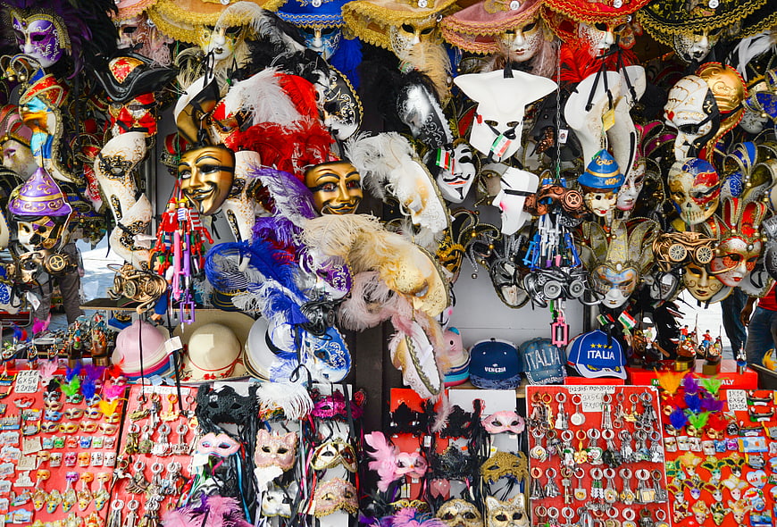 Colorful Venetian Carnival Masks and Souvenirs Display