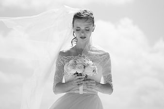 Bride with Bouquet and Veil in Black and White