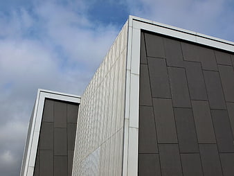 Modern Abstract Architecture with Geometric Facade and Sky