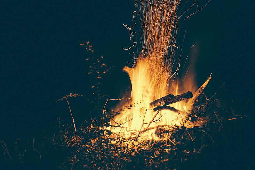 Bonfire with Sparks Flying at Night