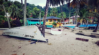 Weathered Fishing Boats on Tropical Sandy Beach