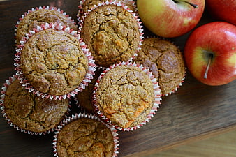 Homemade Apple Muffins with Fresh Apples on Wooden Board