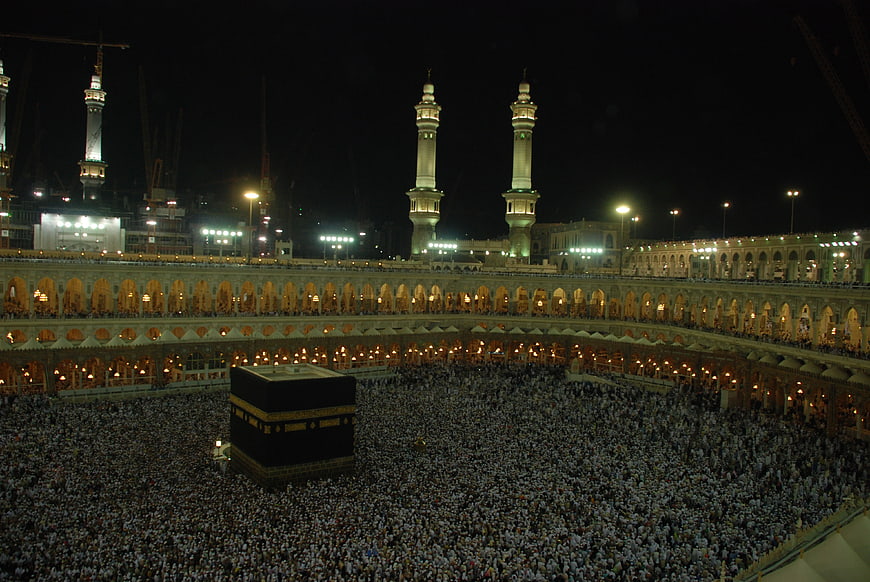Night view of Kaaba in Mecca with massive crowd of pilgrims