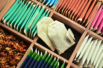 Assorted Tea Bags and Loose Leaf Tea in Wooden Box