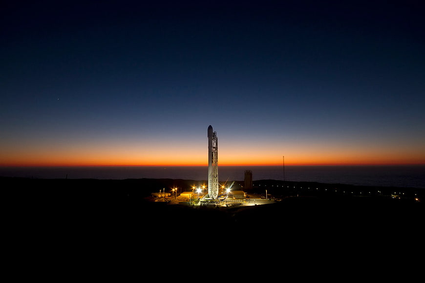 SpaceX Starship rocket on launch pad at twilight