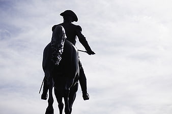 Paul Revere Statue Silhouette Against Cloudy Sky