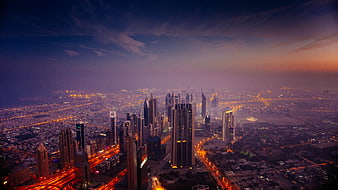 Aerial View of Riyadh Skyline at Dusk with City Lights