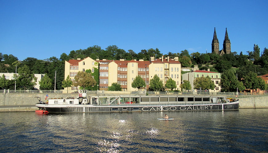 Cargo Gallery Barge On Vltava River With Prague Church Towers
