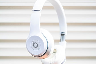 White Beats Headphones on White Slat Background