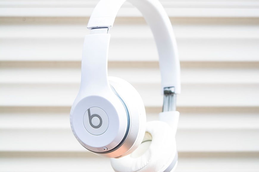 White Beats Headphones on White Slat Background