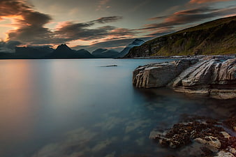 Serene Long Exposure Coastal Landscape at Sunset