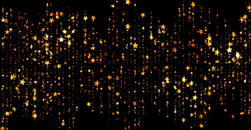 Golden Falling Stars on Black Background