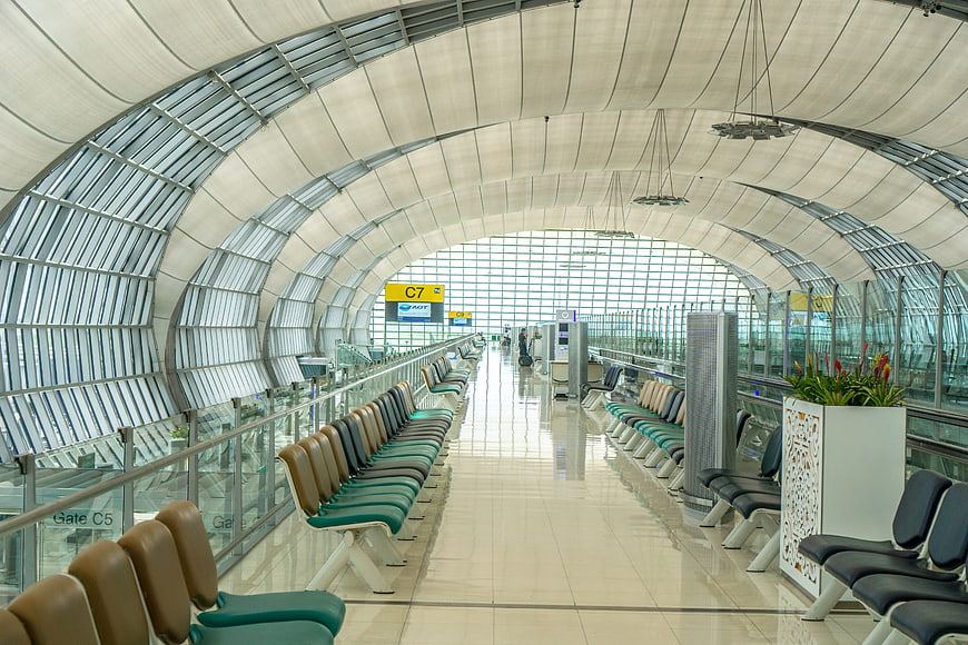 Modern Airport Terminal Waiting Area with Arched Ceiling