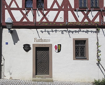 Historic Half-Timbered Town Hall Entrance in Germany