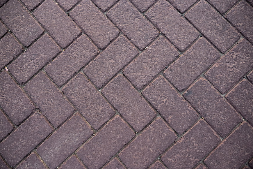Red Brick Pavement Texture in Herringbone Pattern