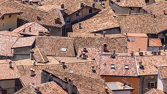 Aerial view of terracotta clay tile roofs in a European town