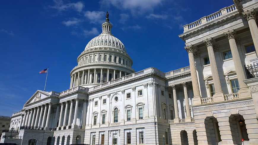 United States Capitol Building Exterior With Blue Sky