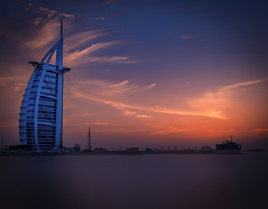 Burj Al Arab Dubai Sunset Skyline with Calm Sea