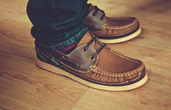 Brown Leather Boat Shoes on Wooden Floor