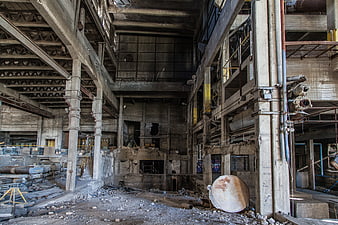 Abandoned Industrial Factory Interior with Concrete Pillars