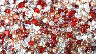 Close-up of red and clear glass beads texture background