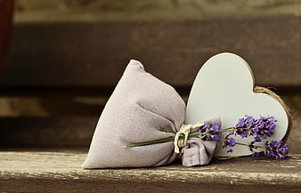 Lavender Sachet and Wooden Heart on Rustic Wood