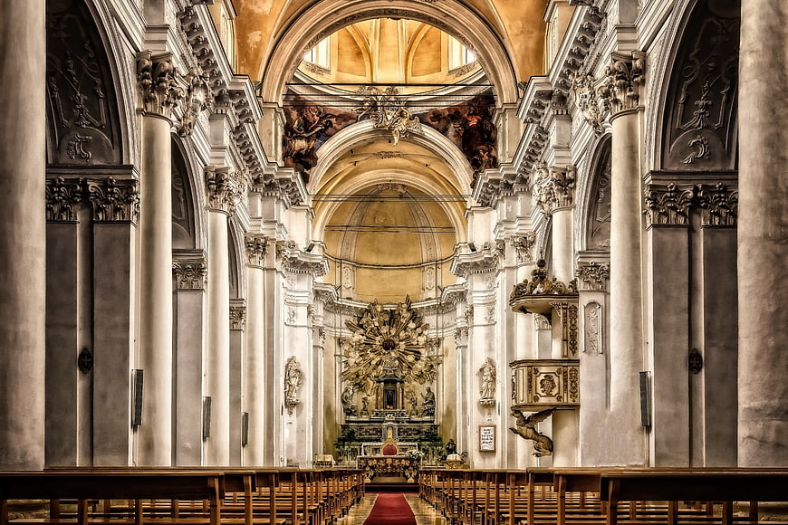 Grand Baroque Cathedral Interior with Ornate Altar and Arches