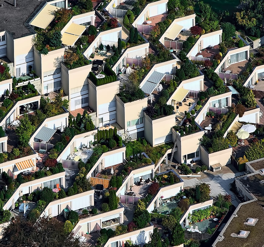 Aerial View of Modern Eco-Friendly Houses with Green Roofs
