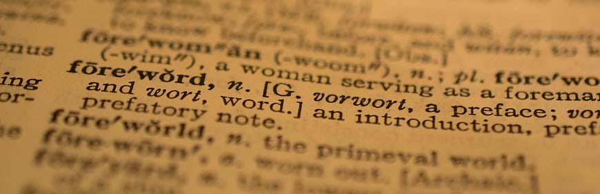 Close-up of vintage dictionary page with foreword definition