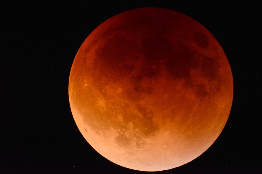 Blood Moon Lunar Eclipse in Night Sky