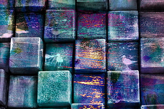 Abstract colorful textured cubes with bird and water patterns