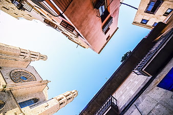 Low angle view of historic European architecture and blue sky