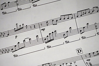 Close-up of classical sheet music with musical notes