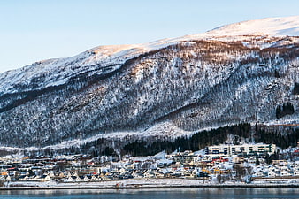 Snowy Mountain Townscape by the Water