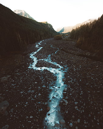 Aerial View of Braided River in Mountain Valley