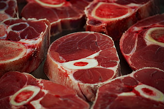 Close-up of raw beef cross-sections with bone marrow
