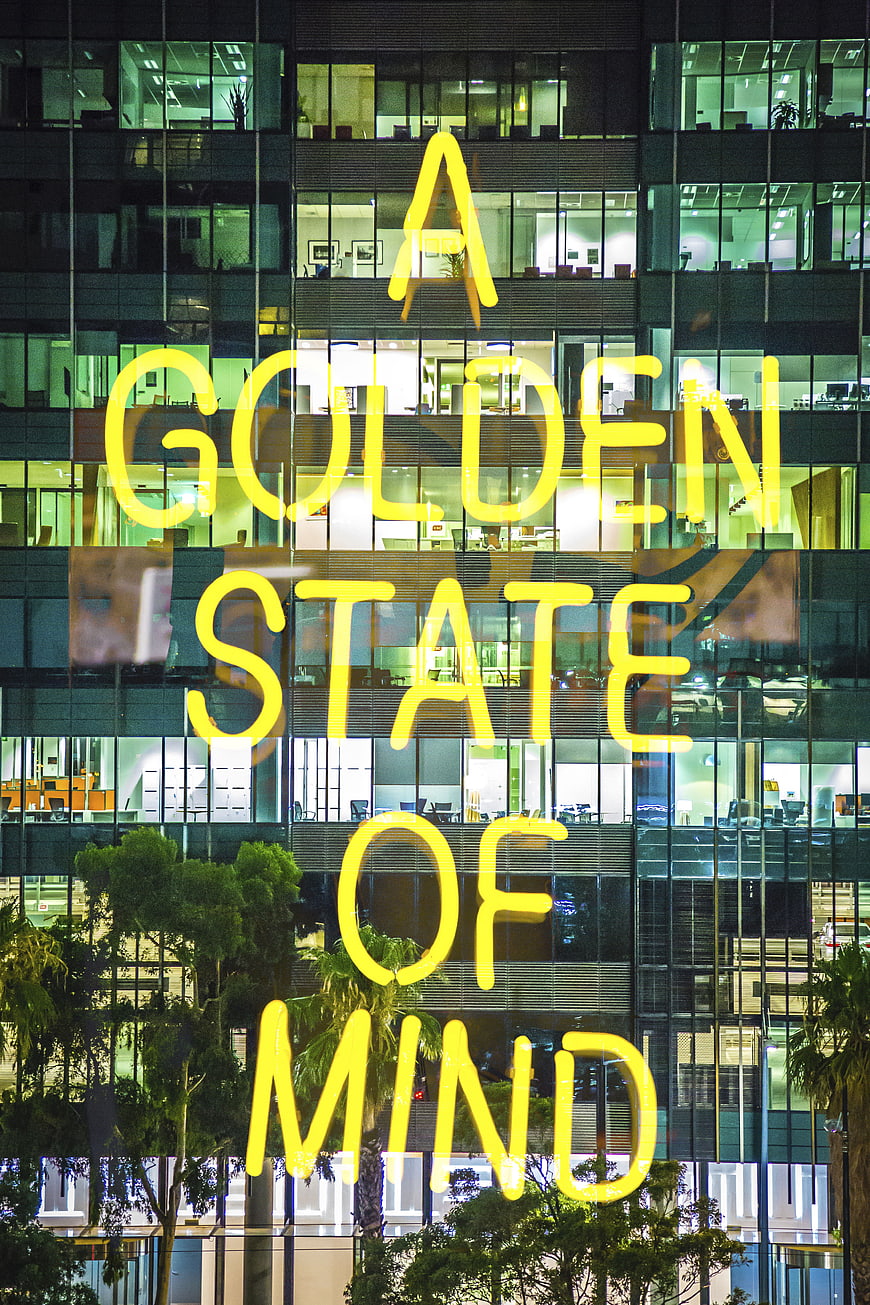 A Golden State of Mind Neon Sign on Glass Building