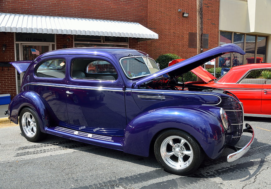 Purple Classic Hot Rod with Open Hood at Car Show