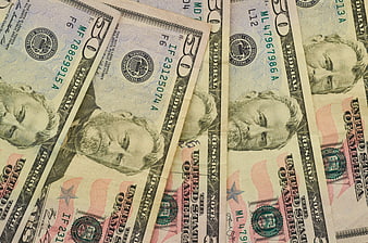 Close-up of United States fifty dollar bills background