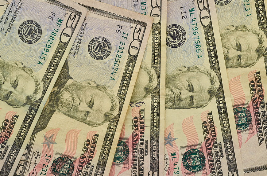 Close-up of United States fifty dollar bills background