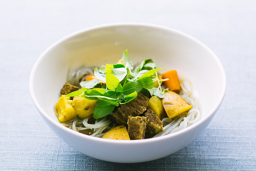Bowl of Thai Green Curry with Beef and Rice Noodles