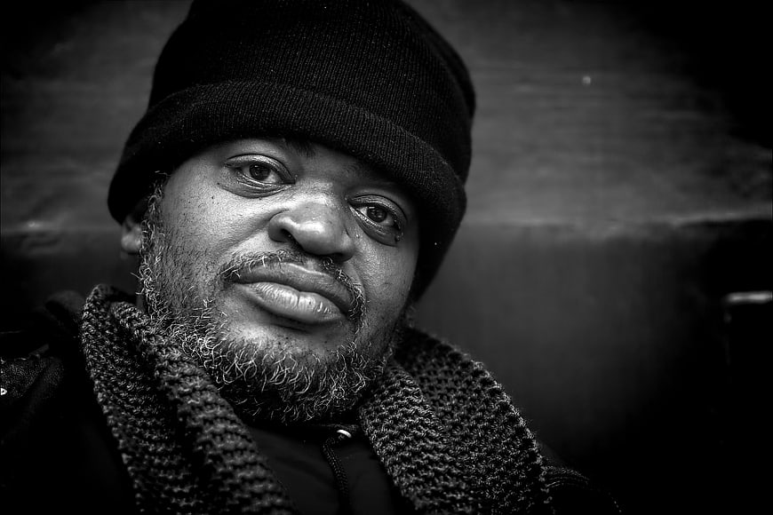 Black and white portrait of a man in winter clothing