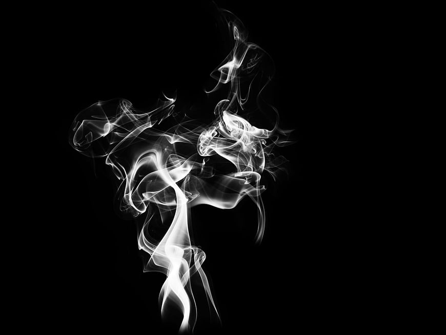 White Smoke Swirls on Black Background Abstract Texture