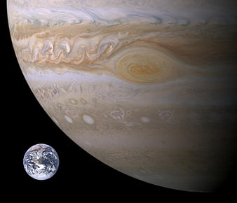 Jupiter and Earth Size Comparison in Space